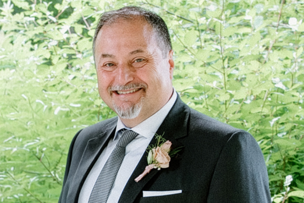 Portrait of Joe Comitale, Executive Vice President of M-D Building Products, retiring after 48 years